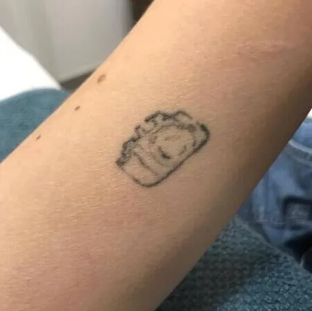 Tatuaje Andrea Garte llegada - Cámara de fotos